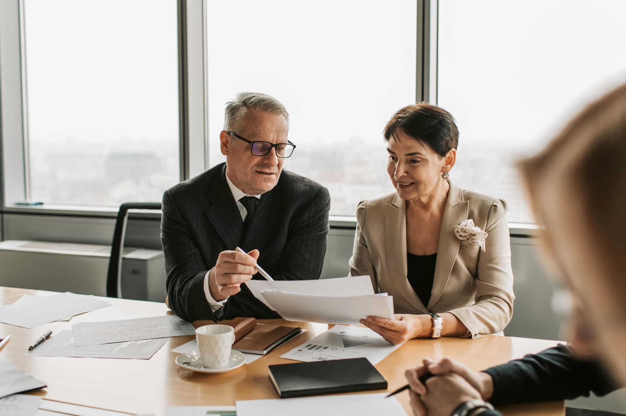 Patient and clinician reviewing treatment funding information